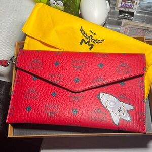 MCM Red Leather Clutch with Rocket Motif